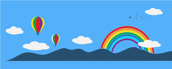 Sky with clouds and rainbow in the mountains background