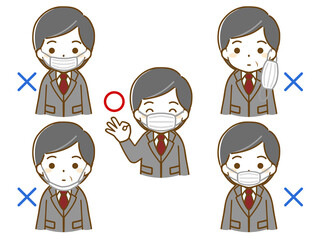 マスクをしているスーツの中年男性