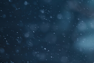 blue snowfall bokeh background, abstract snowflake background on blurred abstract blue