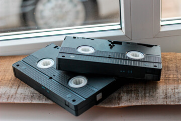 Obraz premium cassette, tape, isolated, audio, music, video, technology, sound, data, white, digital, equipment, old, media, plastic, computer, record, recording, object, magnetic, retro, cd, black, camera, stereo