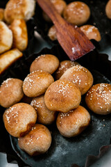 Fresh homemade bread taken from the wood oven. Close up of rustic whole meal bread rolls