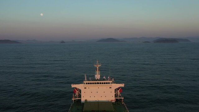 4K(24fps) Fly above panamax size bulk carrier vessel.