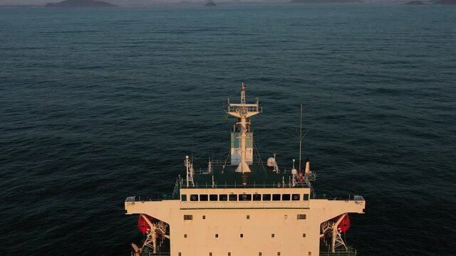 4K(24fps) Fly above panamax size bulk carrier vessel.