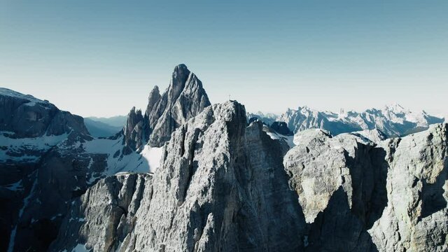 Spiral aerial footage of the famous "Cima Una - Einserkofel" in the Italian Dolomites. The "Croda dei Toni - Zwölferkofel" is passing by in the background.