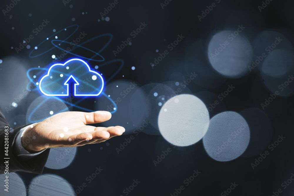 Poster cloud computing and innovation concept. businessman hand holding abstract glowing icon on dark bokeh