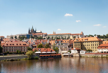 Naklejka na ściany i meble Historic part of Prague, Vltava river