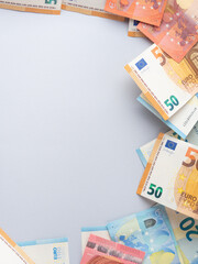 Euro money currency banknotes frame on blue background