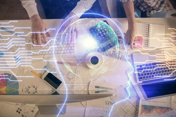Double exposure of man and woman working together and human brain hologram drawing. Brainstorm...