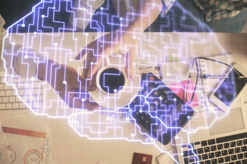 Double exposure of man and woman working together and human brain hologram drawing. Brainstorm...