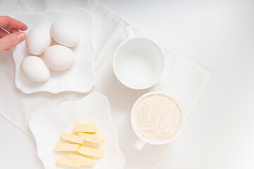 Preparing ingredients for baking. Butter, flour and butter for dough. Recipe ingredients