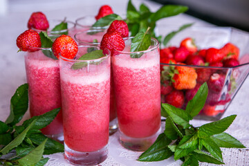 Strawberry smoothie with fresh berries with meant