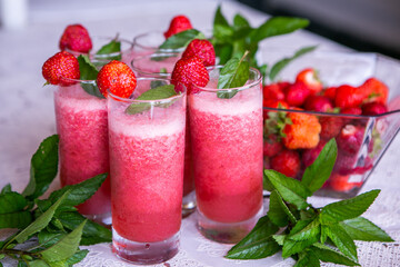 Strawberry smoothie with fresh berries with meant