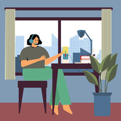 The girl works from home. Record a podcast, book, online broadcast, radio. Freelancer at work
