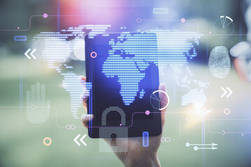 Double exposure of map sketch hologram and woman holding and using a mobile device.