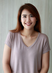 indoor portrait of beautiful healthy young girl on brunette shirt standing with smile and her pretty face looks happy