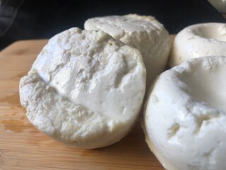 Fototapeta na wymiar Fresh cheeses homemade