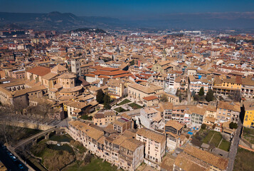 Fototapeta premium Views of houses and nature of ancient city Vic in Catalonia from high..