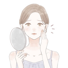 顔の小じわに悩む女性