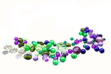 Jewellery suppliers, beads and jewellery findings of different kinds isolated on a white background.