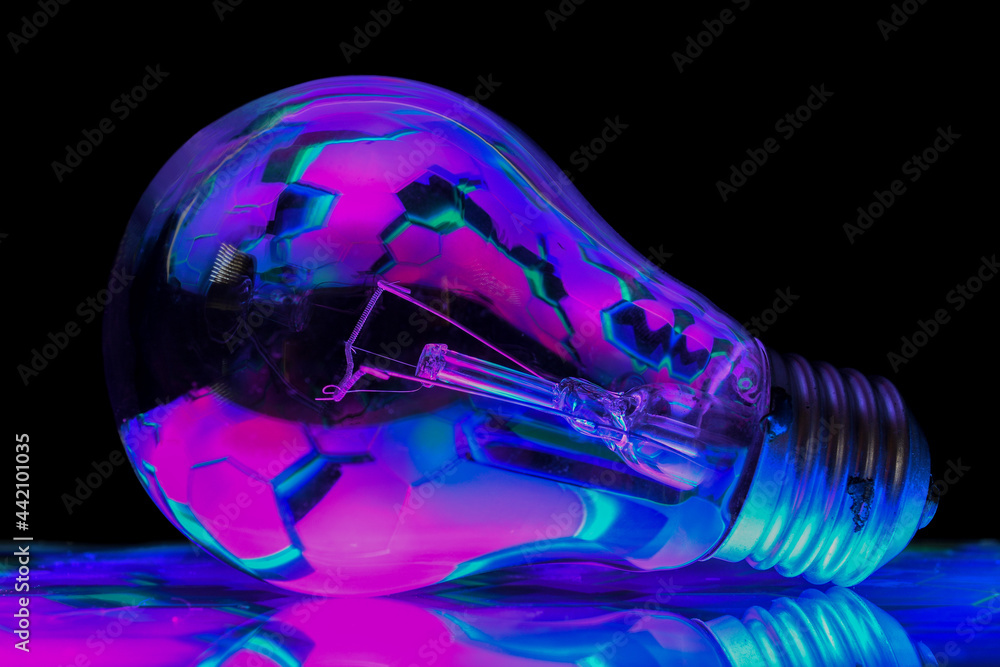 Sticker Light bulb with colorful lights reflecting in it