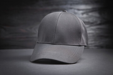 Baseball cap on the black background.