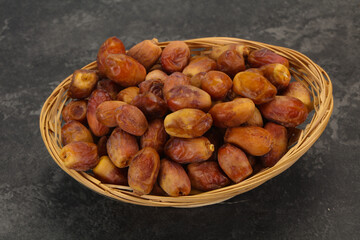Sweet tasty dry dates in the basket