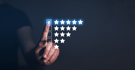 Hand choose five star symbol to increase rating of company.
Concept of satisfaction, quality and...