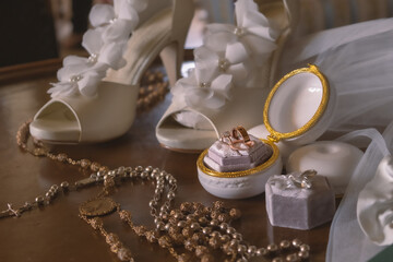 wedding rings on the table