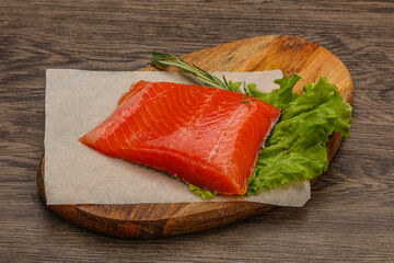 Salmon piece steak served rosemary