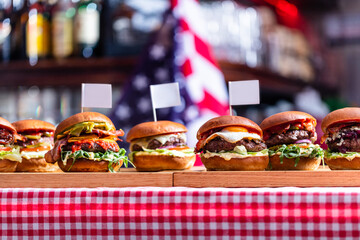 Burgers in american restaurant with empty toothpick flags
