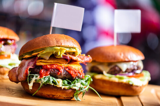 Burgers in american restaurant with empty toothpick flags