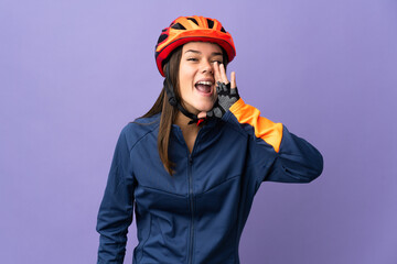 Teenager cyclist girl shouting with mouth wide open