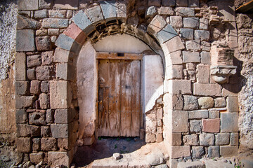 Old Wooden door on a building in the Peruvian Andes, South America.