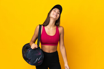 Teenager sport girl with sport bag laughing