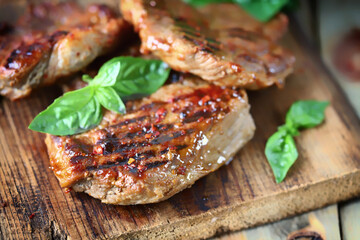 Selective focus. Appetizing juicy grilled steak. Close-up.