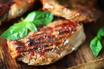 Selective focus. Appetizing juicy grilled steak. Close-up.