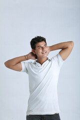 Young indian college student showing expression on white background