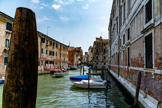 A Water Canal (so-called Riva) in Venice, Italy. These waterways are the main means of transport in the city