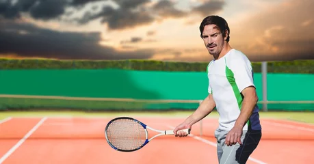 Foto op Canvas Composition of male tennis player holding tennis racket at tennis court © vectorfusionart