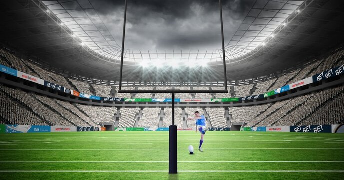 Composition of male rugby player kicking ball at stadium