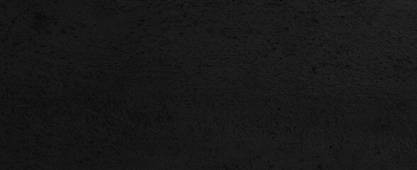 Fototapeta premium Panorama of Black grey concrete texture, Rough cement stone wall, Surface of old and dirty outdoor building wall, Abstract nature seamless background