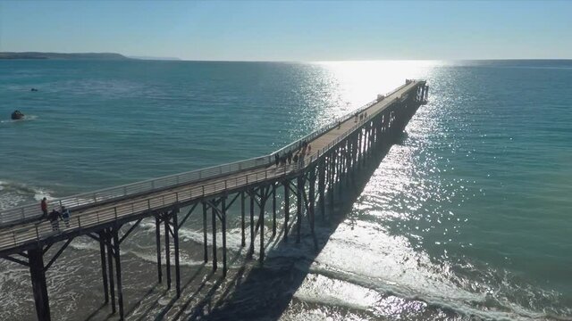 Aerial: San Simeon pier in Big Sur, California, USA