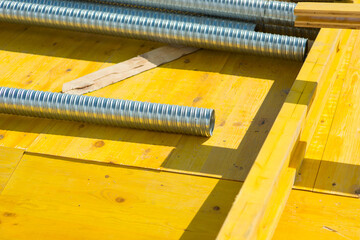 cut corrugated metal pipe at construction site
