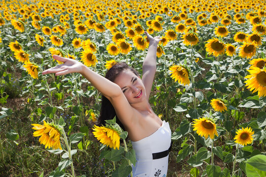 Singing in a sunflower field