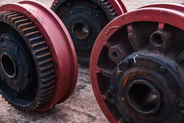 New steel wheels with gears for a harbor crane.