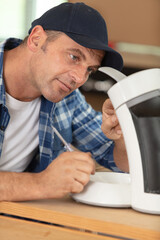 repairing of broken coffee machine