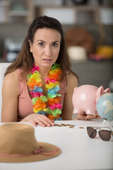 portrait of sad woman with no money for travelling