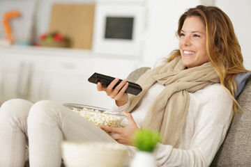 woman enjoying watching tv
