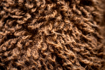 Macro photo of brown towel texture background.