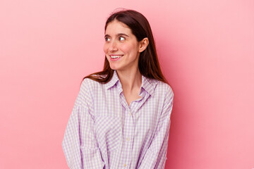Fototapeta premium looks aside smiling, cheerful and pleasant.